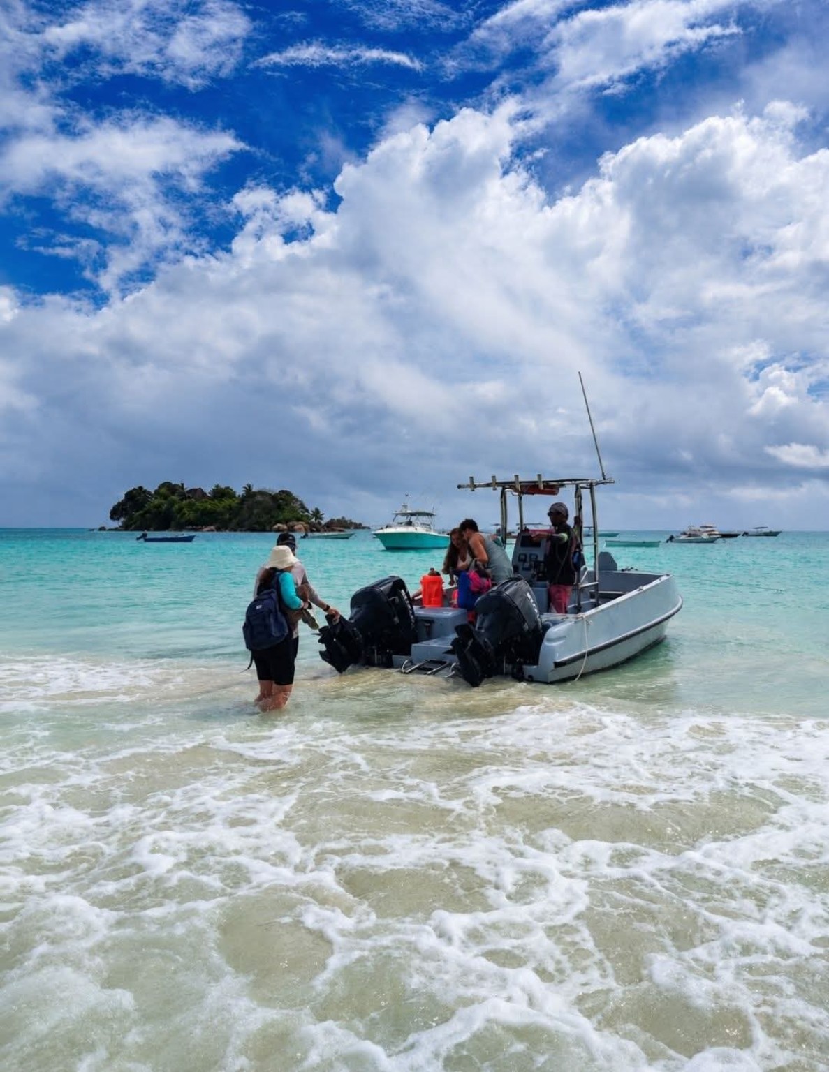 JJ's Charters boat on a tropical beach