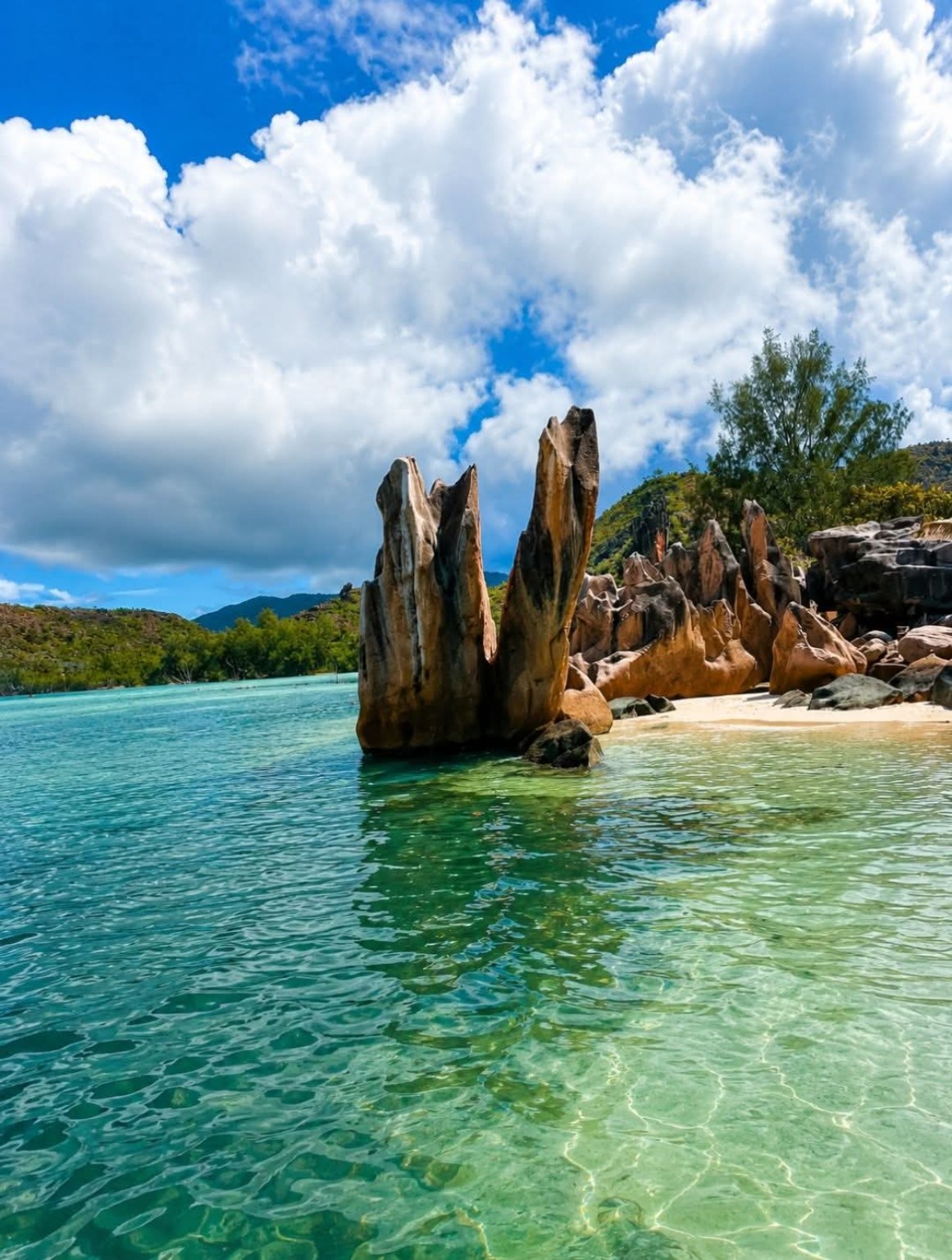 Granite rocks and turquoise water at Curieuse